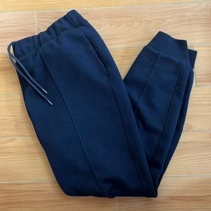 Uniqlo Navy joggers with seam down the leg